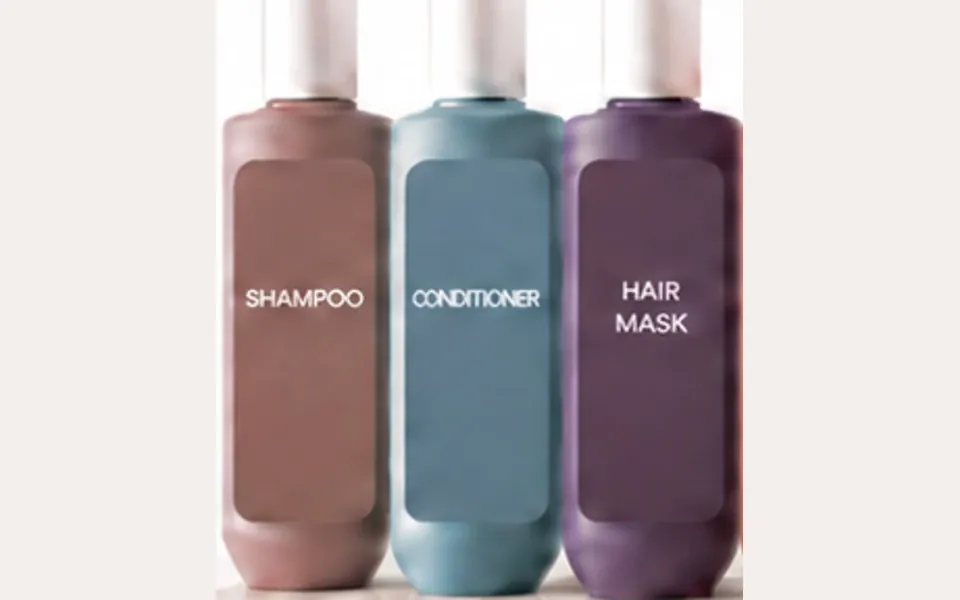 Unbranded haircare bottles shown in the source case study